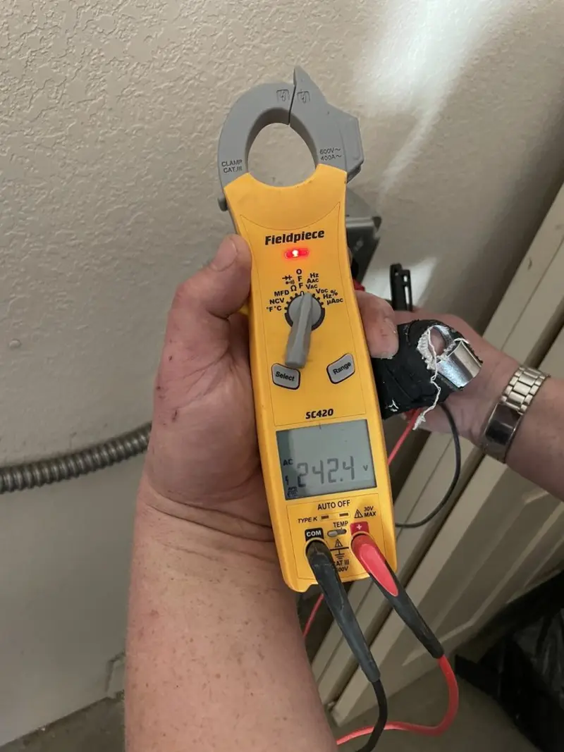 Voltage testing with clamp meter during Generator Installation in Windham